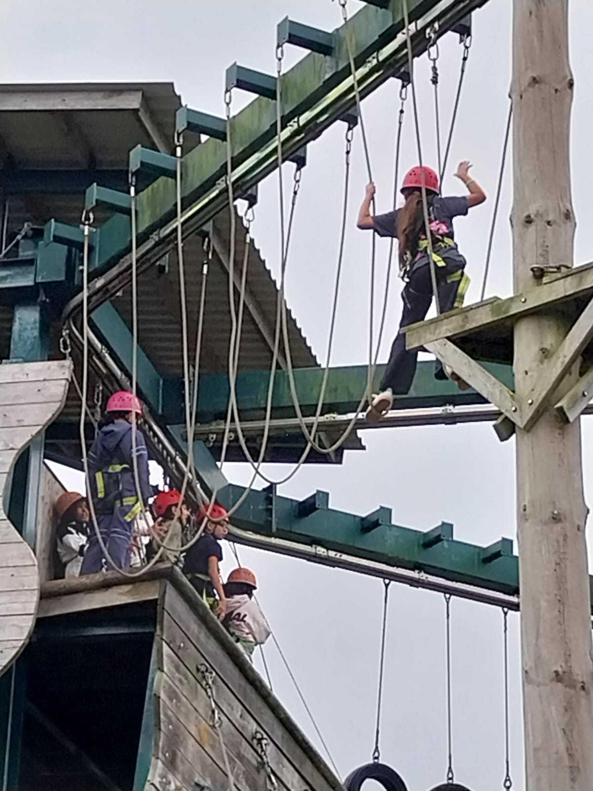 Girl on high rope course