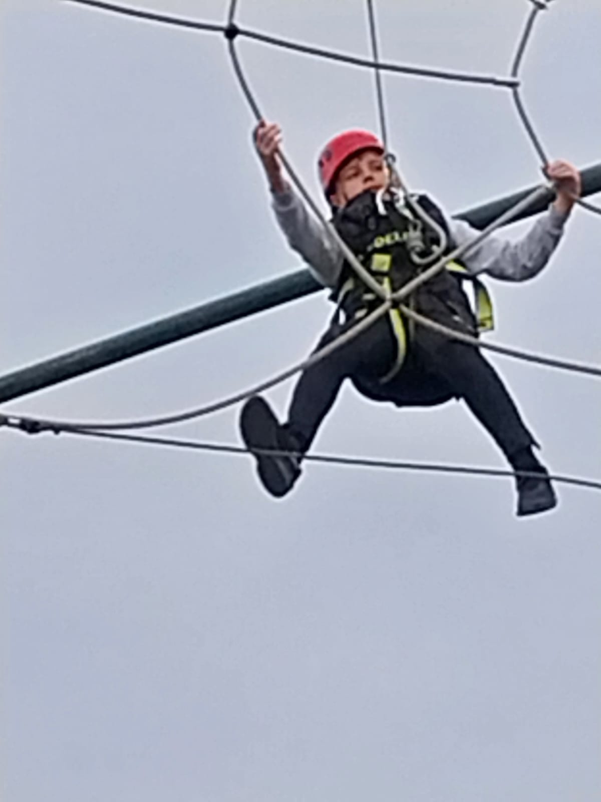 child on high wire course