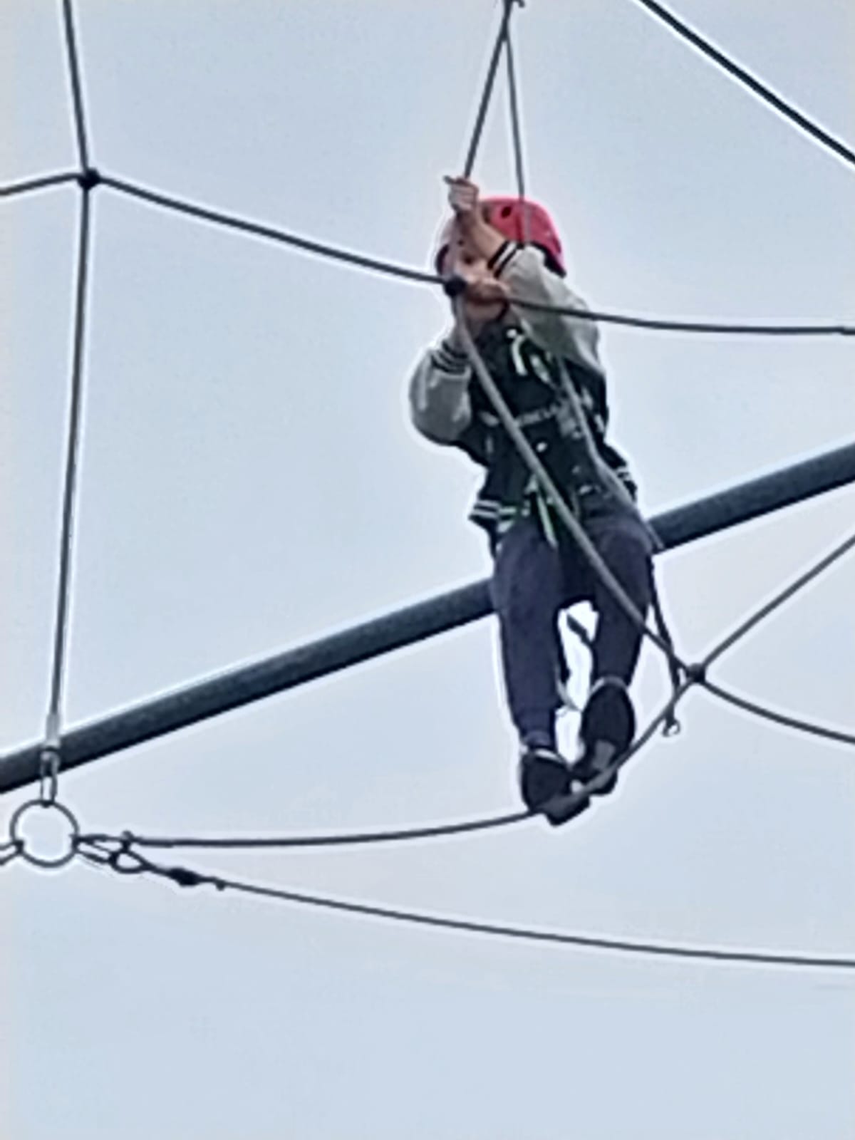 Child on high rope course