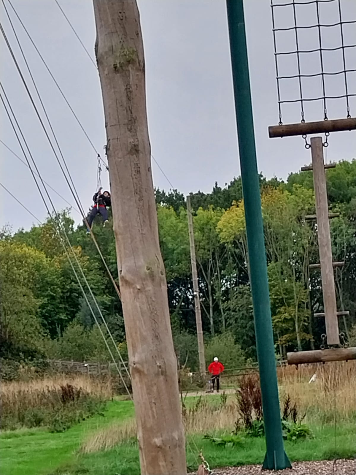 Child whizzing down the zip wire