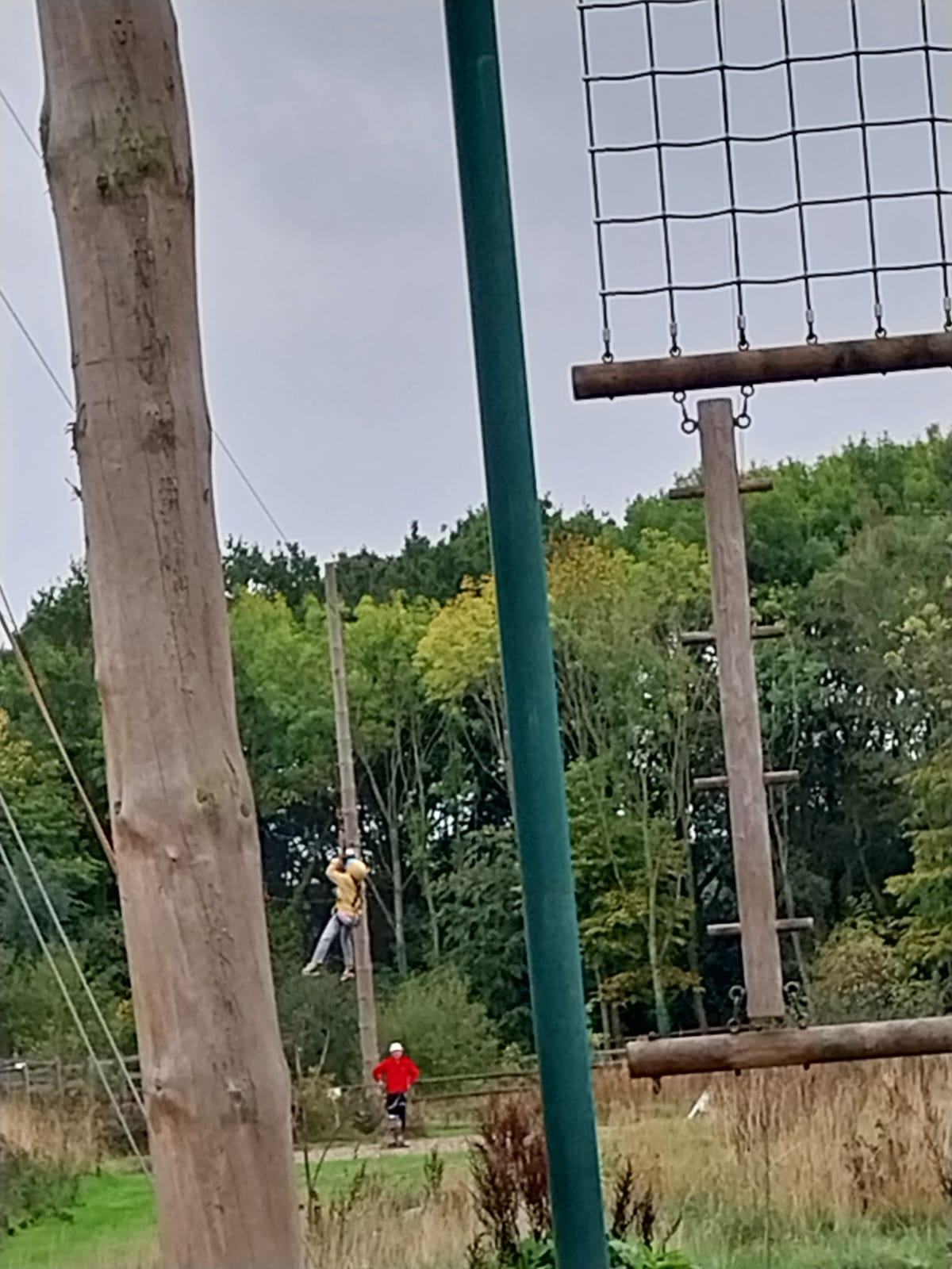 Child whizzing down the zip wire