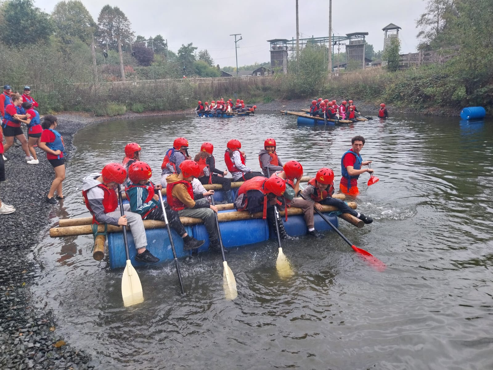 Some children on a raft in the water