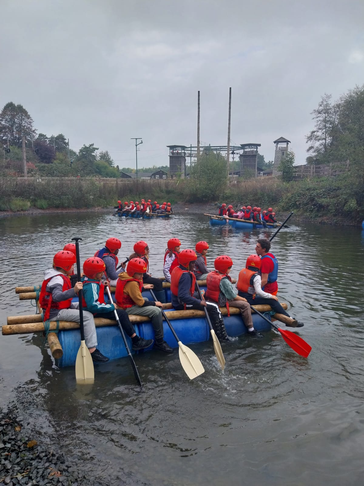Some children on a raft in the water
