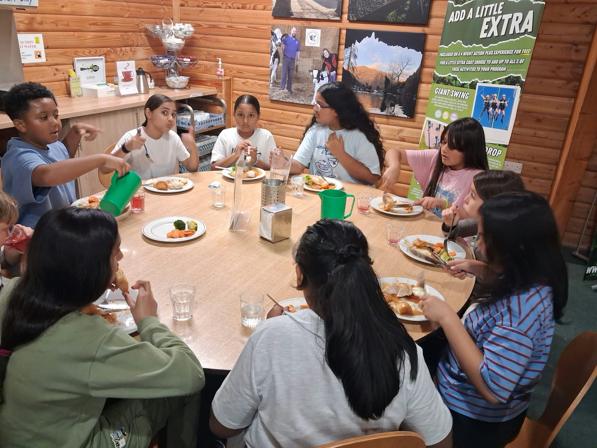 Year 5 & 6 children enjoying their dinner
