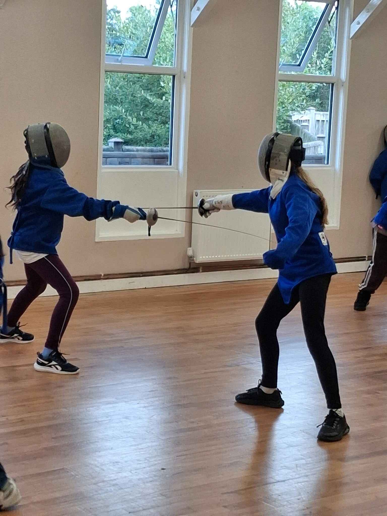 Group 1 children doing fencing