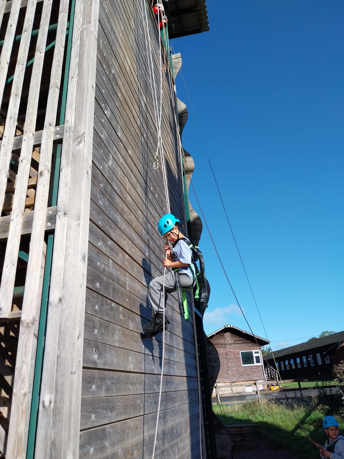Group 2 children doing abseiling and zip wire