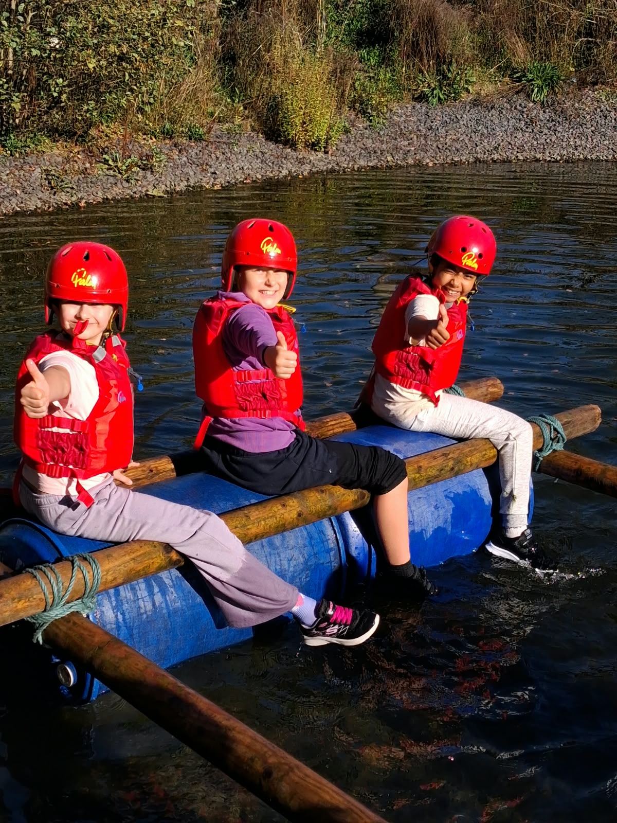 Year 5 & 6 children building and testing rafts