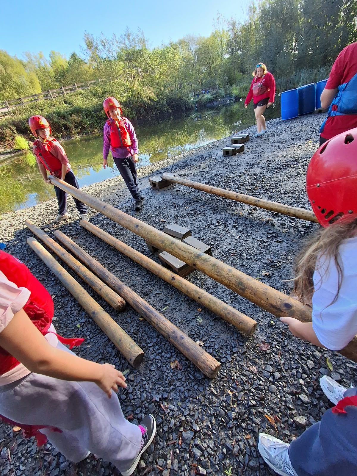 Year 5 & 6 children building and testing rafts