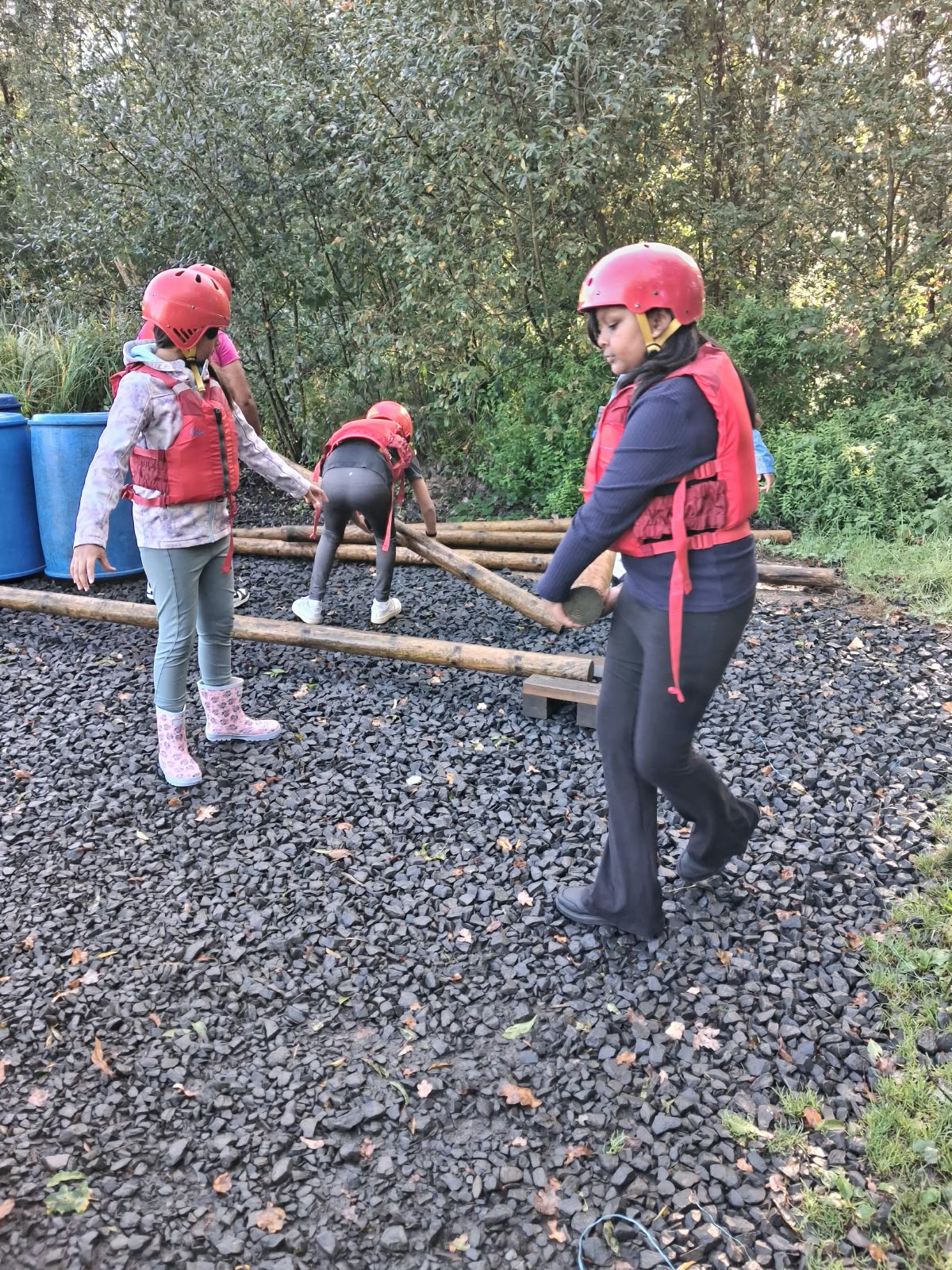 Year 5 & 6 children building and testing rafts