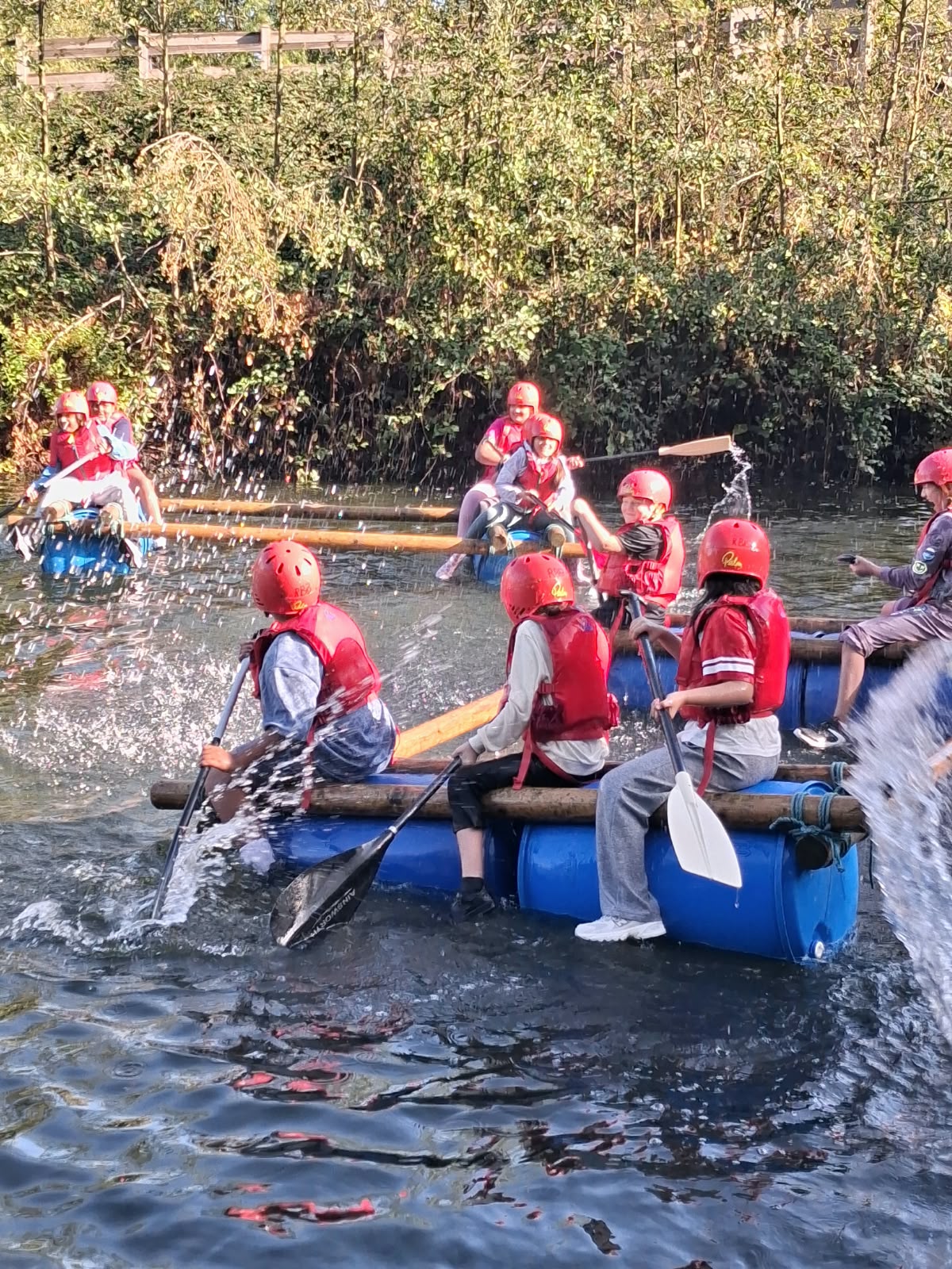 Year 5 & 6 children building and testing rafts