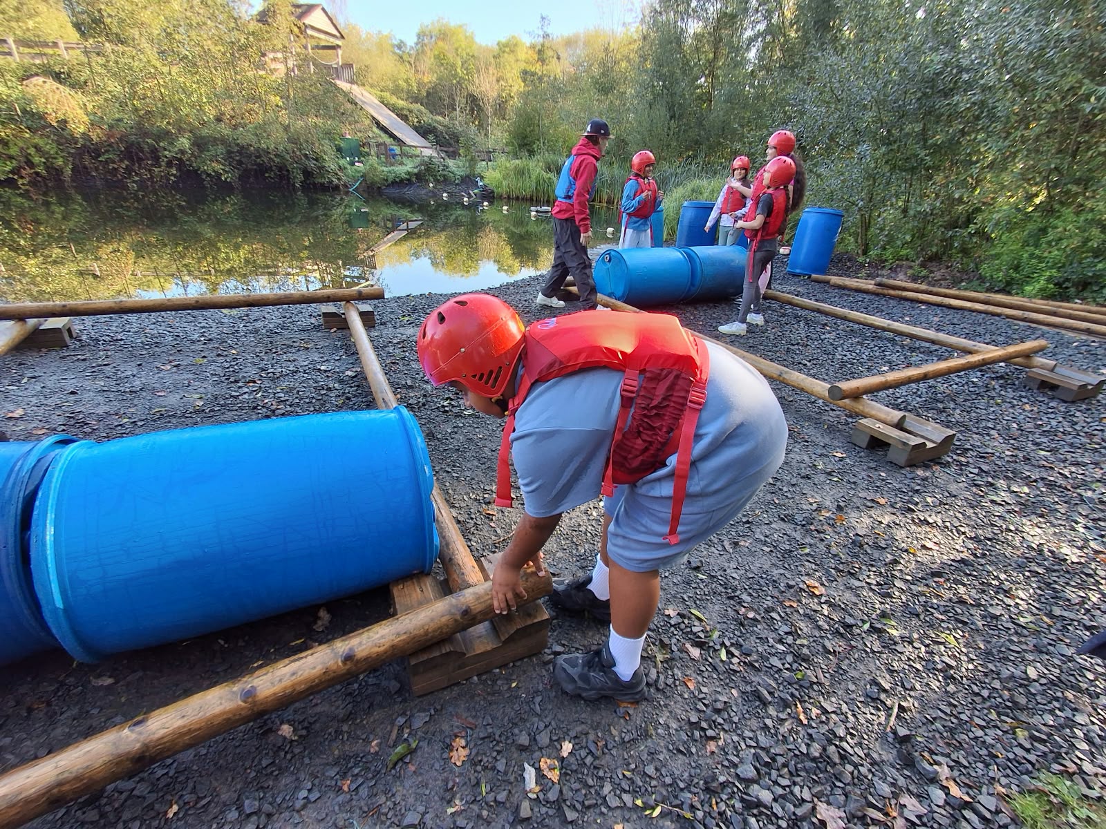 Year 5 & 6 children building and testing rafts