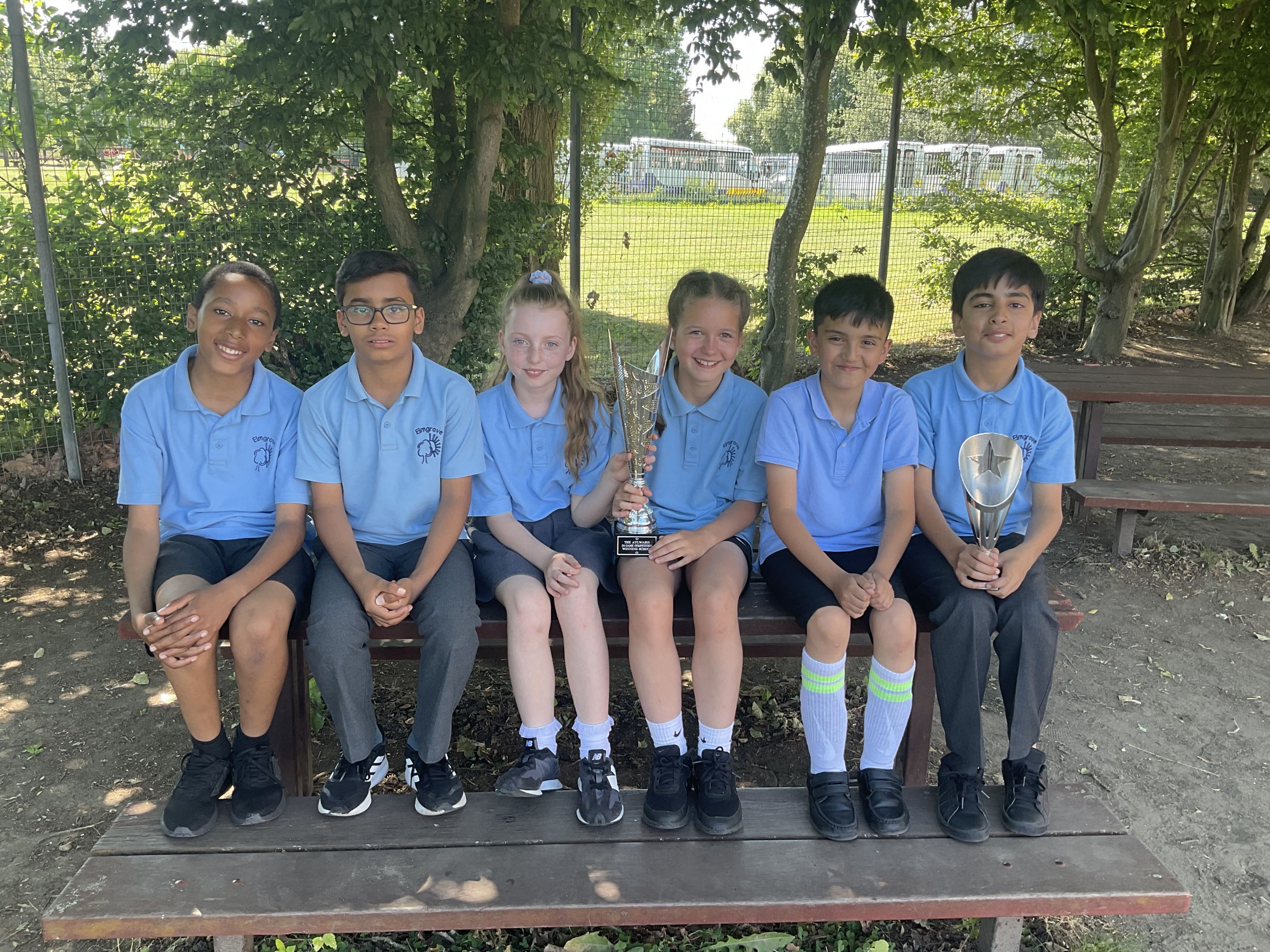 Another smile with the winning trophy at school